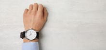 Arm with wristwatch